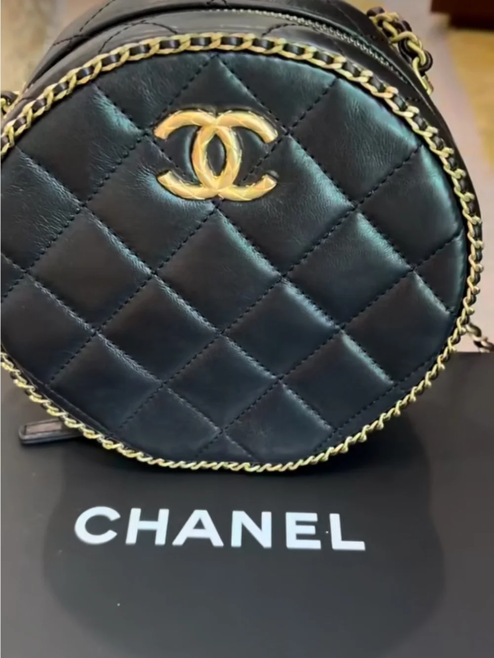CHANEL Black Quilted Round Crossbody with Gold CC